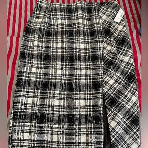 New with tags, lined plaid skirt with front slit